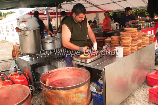 espagne asturies 16.JPG - Préparation d'un poulpeLlanes Fête San RoqueAsturies, Espagne
